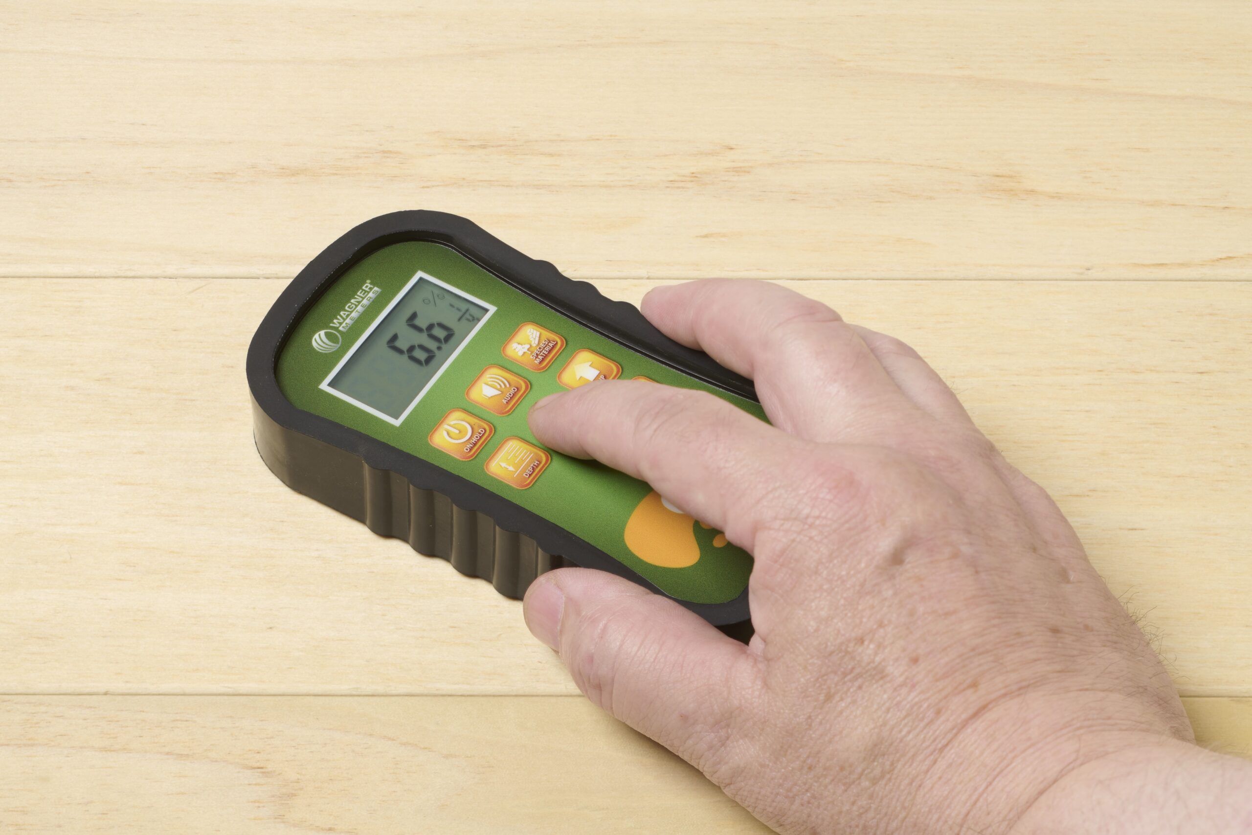 Using a wood moisture meter